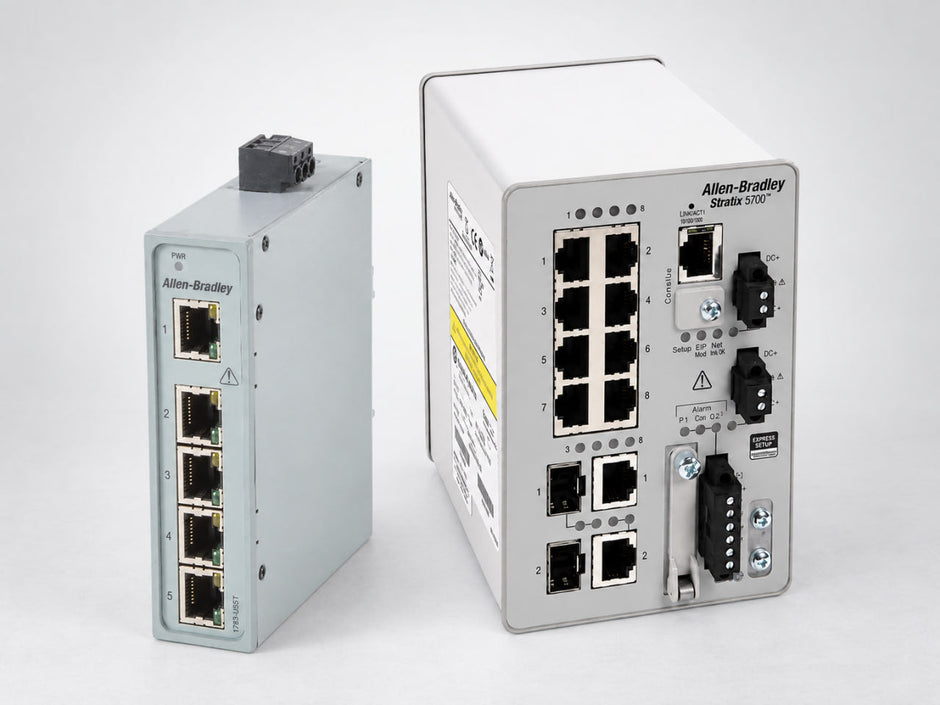 Allen-Bradley Stratix 2000 unmanaged switch and Stratix 5700 managed switch side by side, showing the port and faceplate difference between an unmanaged and a managed industrial Ethernet switch