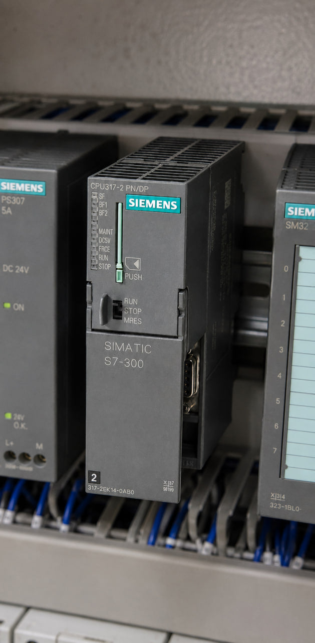 Siemens S7-300 CPU 317-2 PN/DP with PROFINET and PROFIBUS ports mounted in a control panel